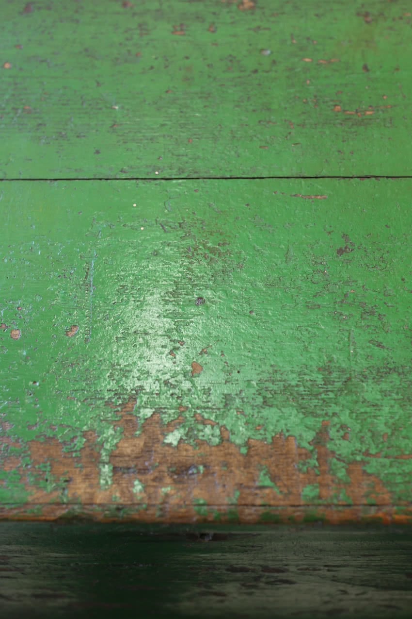 pretty original painted vivid green pine linen chest with very old lining paper inside, the chest sits on original casters.